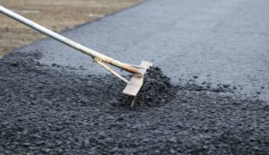 Asphalt being spread out